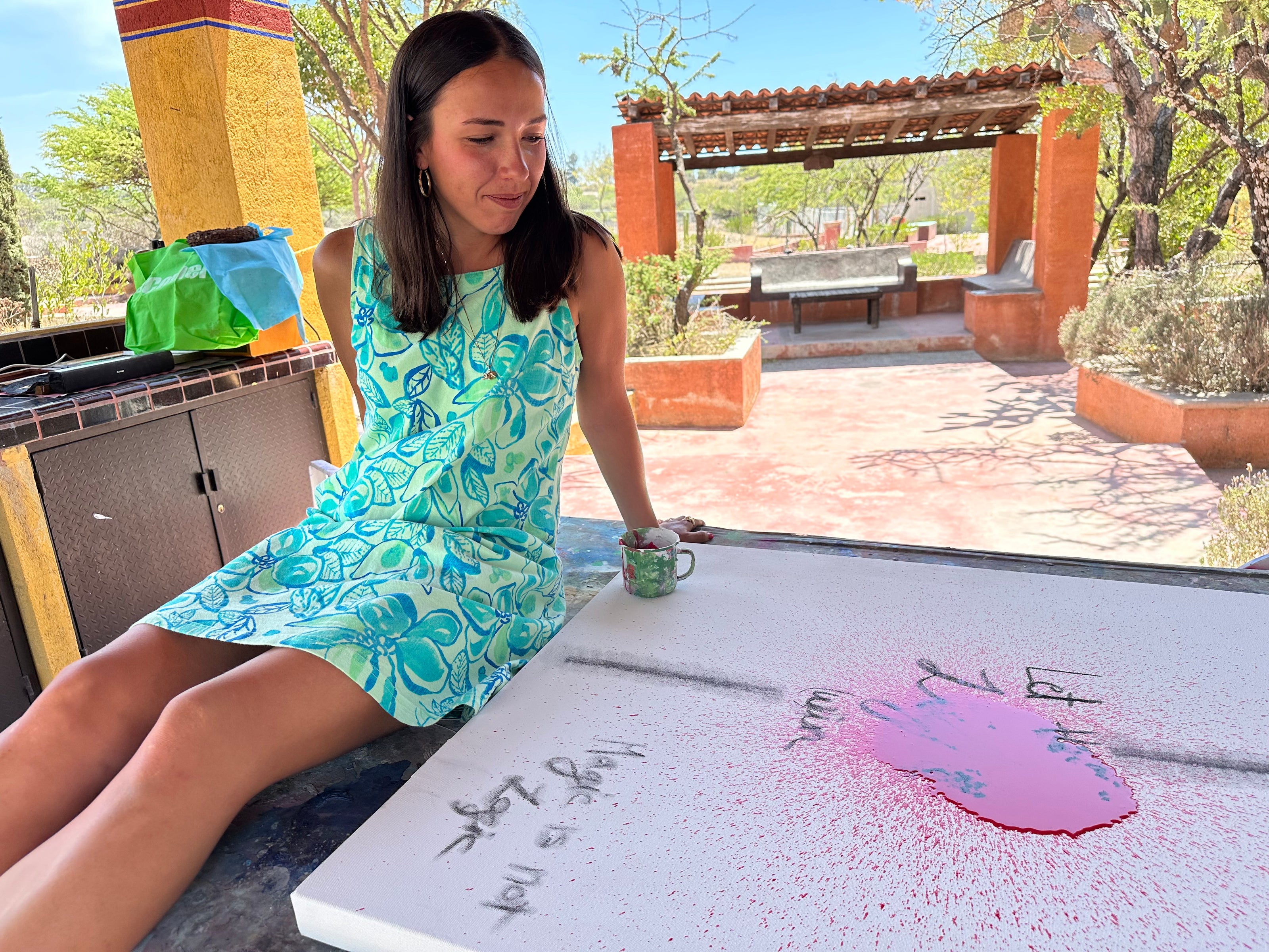 Art_Mexican_Alexandra_Schurmann_Belendez_The_Process_Magic_is_not_Logic_dripped_red_with_artist_looiking
